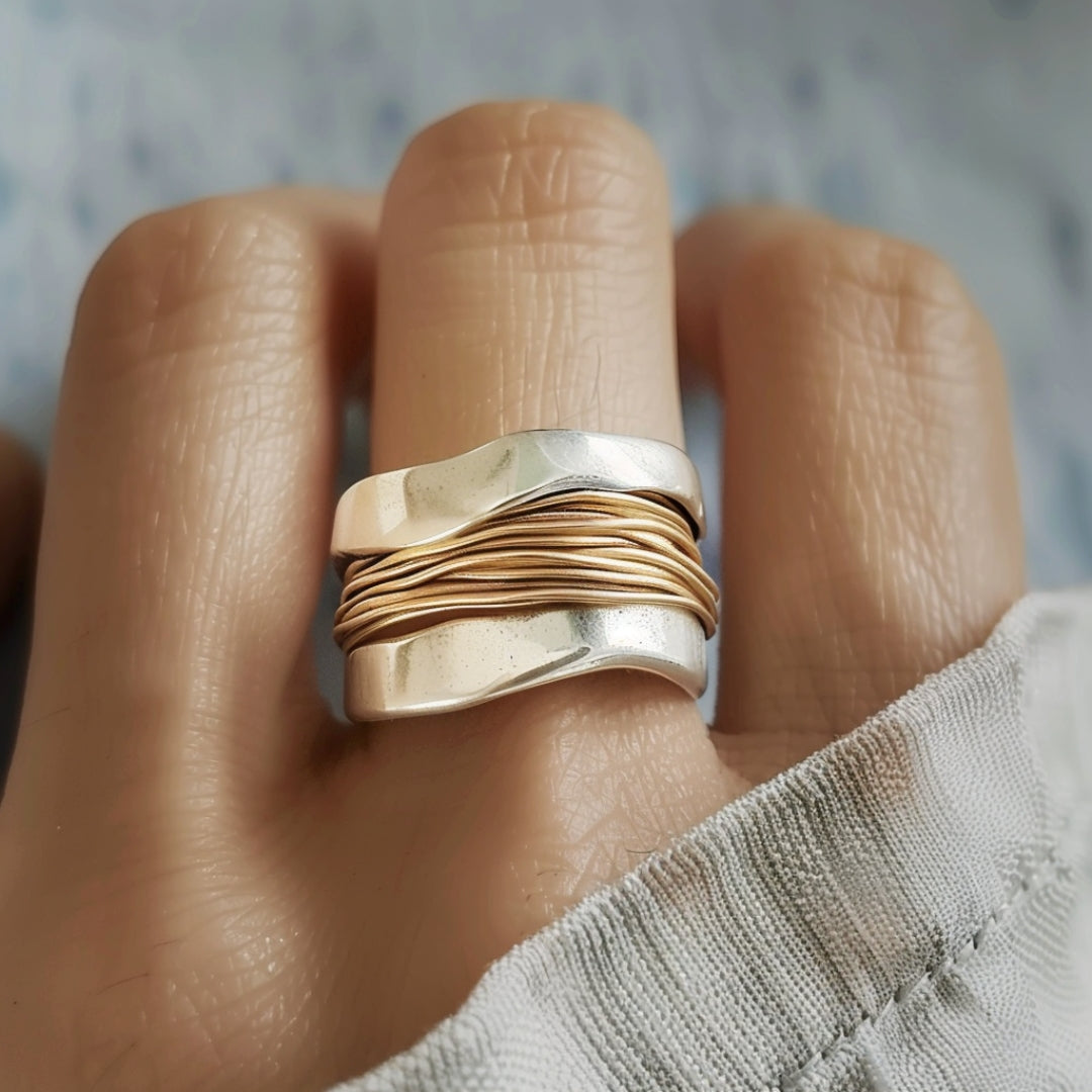 Antonia Anillo de plata con hilos dorados